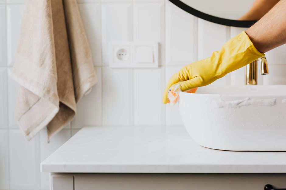 Cleaning modern bathroom sink